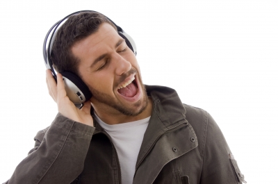 Man singing with headphones.
